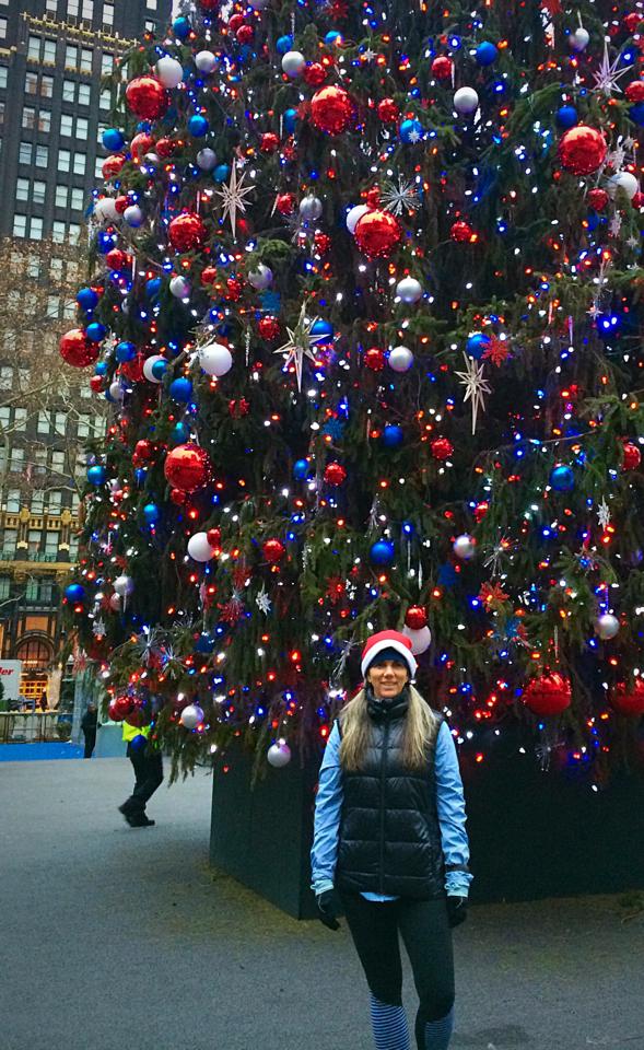 Lisa and the beautiful red white and blue tree in Bryant Park.
