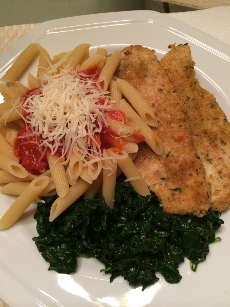 Penne with tomato sauce and parmesan cheese, chicken cutlets (baked, not fried) and sautéed spinach.