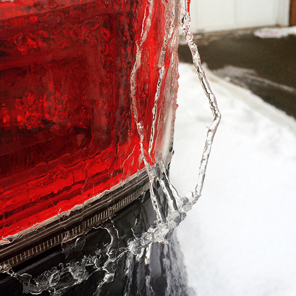 a crazy bent icicle hanging from the tail light on my Subaru
