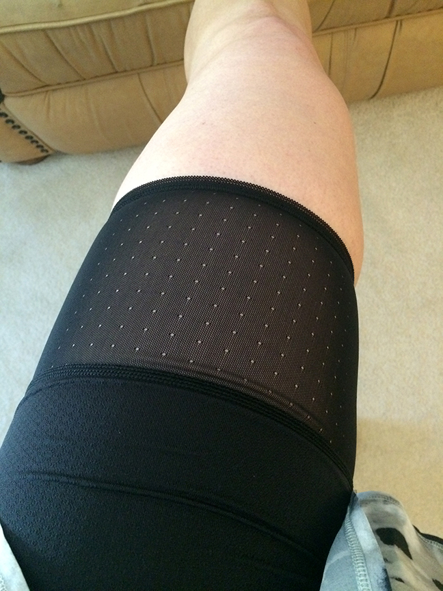 Love how the boring compression short turns into what looks like stockings. It's a pretty feminine detail and let's be honest....hot summer runs require breathability. 