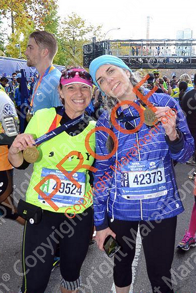D.O.N.E. We did it! This was lisa's 13th NYC Marathon and 52nd marathon overall. 