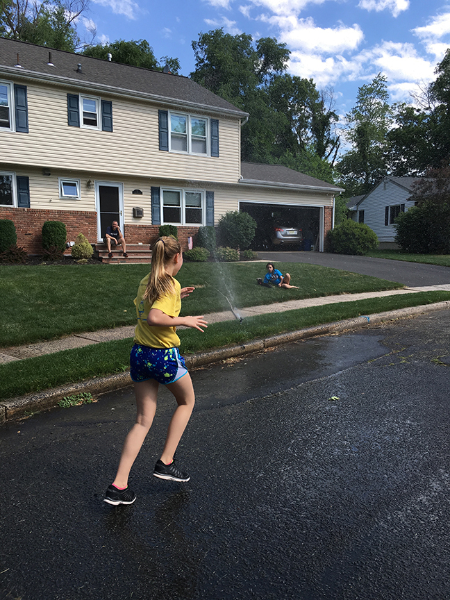 She ran through every sprinkler! It was HOT out.