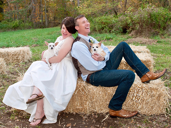 the bride and groom and their pups